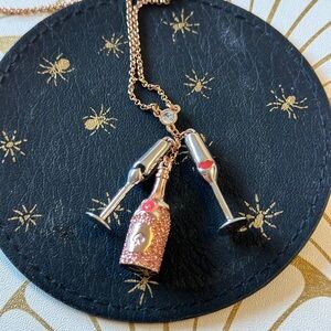 Kate Spade “Make Magic” Champagne Cluster Pendant